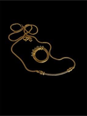 Gold-Tone Multi-Ring Pendant Necklace with Pavé Bar Accent